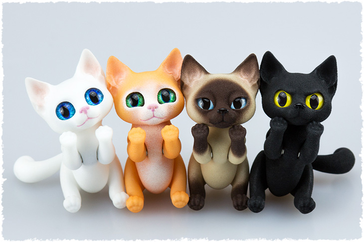 All 4 kittens. Dexter, Shadow, Zana and Kiki - magnetic toy cats were printed by a 3D printer