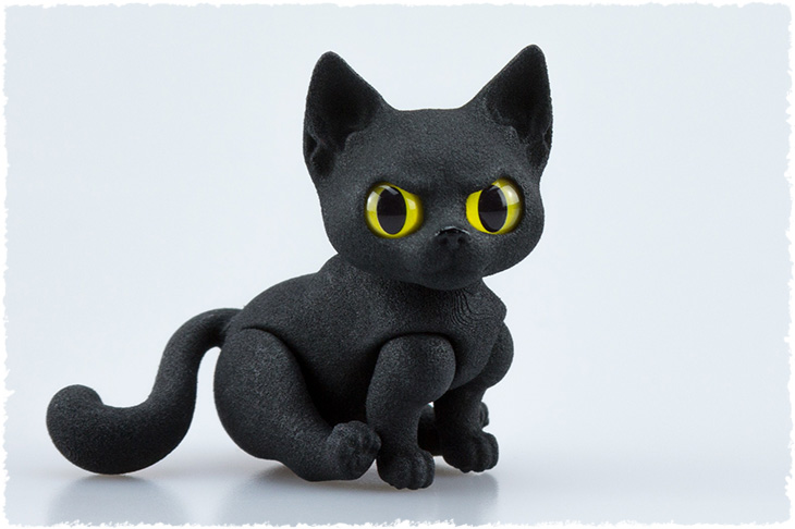 Shadow the kitten is black young kitty poseable doll